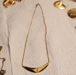 Elegant Gold and Black Necklace